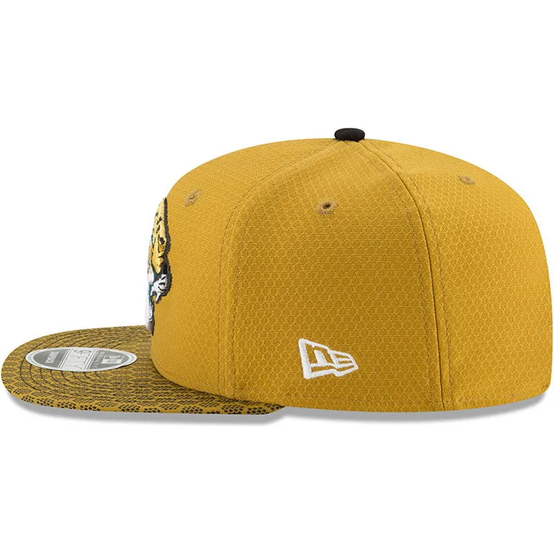 kepure-plokscia-geltona-snapback-9fifty-sideline-jacksonville-jaguars-nfl-new-era kepure-plokscia-geltona-snapback-9fifty-sideline-jacksonville-jaguars-nfl-new-era