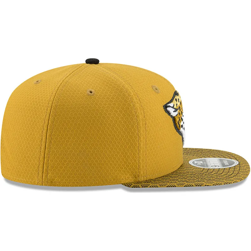 kepure-plokscia-geltona-snapback-9fifty-sideline-jacksonville-jaguars-nfl-new-era kepure-plokscia-geltona-snapback-9fifty-sideline-jacksonville-jaguars-nfl-new-era