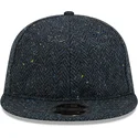 kepure-plokscia-tamsiai-melyna-reguliuojamas-9fifty-tweed-new-era