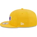 kepure-plokscia-geltona-snapback-9fifty-draft-edition-2023-los-angeles-lakers-nba-new-era