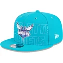 kepure-plokscia-melyna-snapback-9fifty-draft-edition-2023-charlotte-hornets-nba-new-era