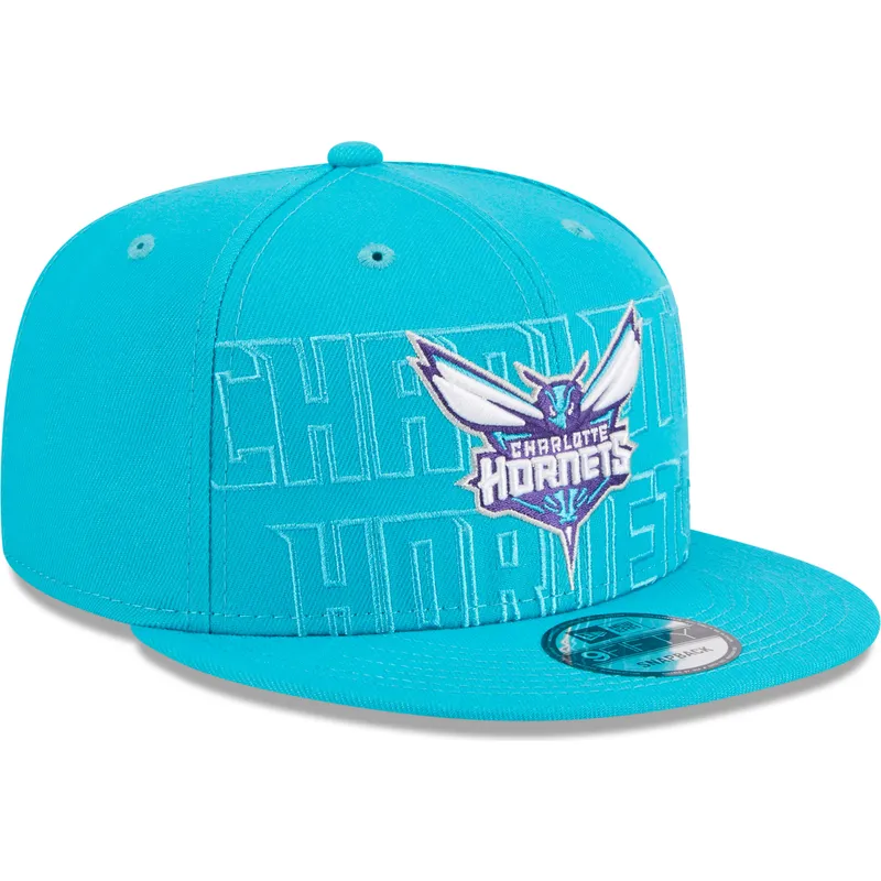 kepure-plokscia-melyna-snapback-9fifty-draft-edition-2023-charlotte-hornets-nba-new-era