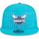 kepure-plokscia-melyna-snapback-9fifty-draft-edition-2023-charlotte-hornets-nba-new-era