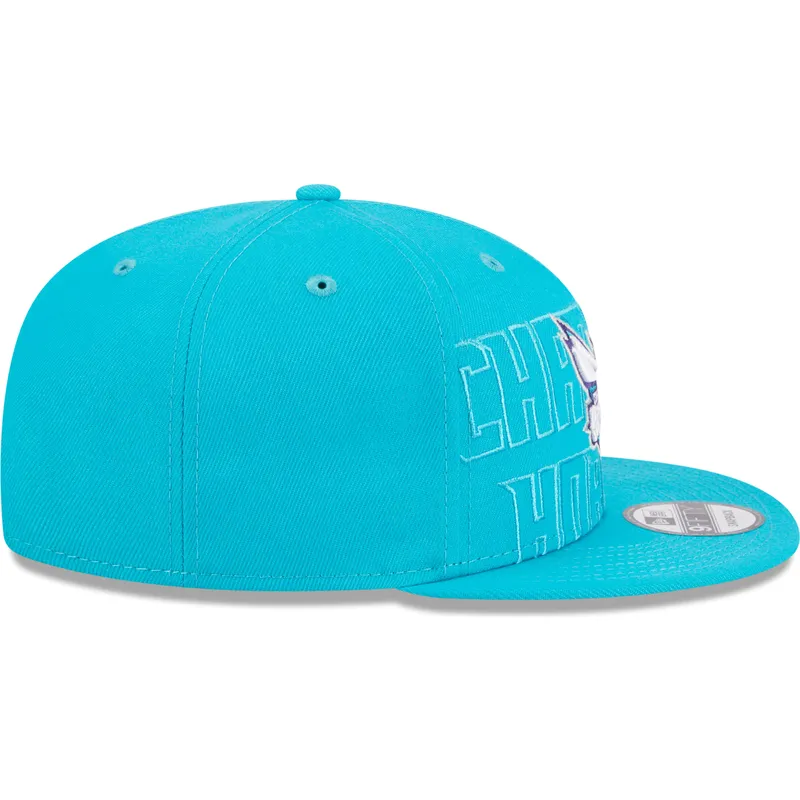 kepure-plokscia-melyna-snapback-9fifty-draft-edition-2023-charlotte-hornets-nba-new-era