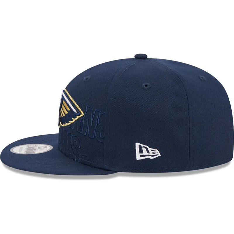 kepure-plokscia-tamsiai-melyna-snapback-9fifty-draft-edition-2023-new-orleans-pelicans-nba-new-era