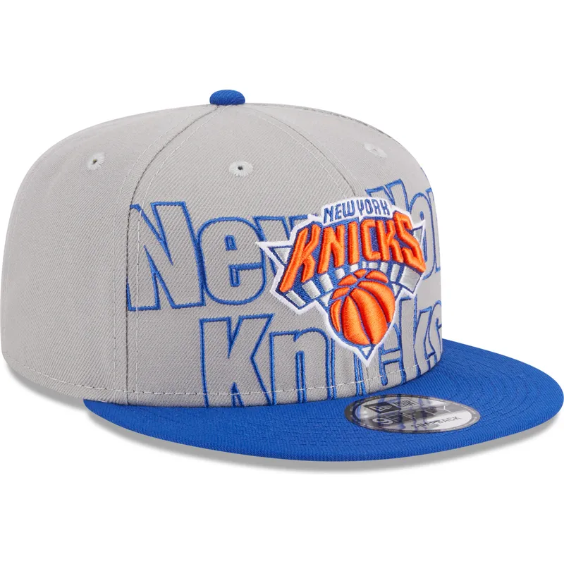 szara-i-niebieska-czapka-z-daszkiem-snapback-9fifty-draft-edition-2023-new-york-knicks-nba-new-era