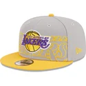 snapback-9fifty-draft-edition-2023-los-angeles-lakers-nba-od-new-era-szara-i-zolta-czapka-z-plaskim-daszkiem