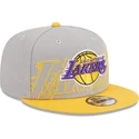 snapback-9fifty-draft-edition-2023-los-angeles-lakers-nba-od-new-era-szara-i-zolta-czapka-z-plaskim-daszkiem