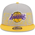 snapback-9fifty-draft-edition-2023-los-angeles-lakers-nba-od-new-era-szara-i-zolta-czapka-z-plaskim-daszkiem