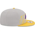 kepure-plokscia-pilka-snapback-9fifty-draft-edition-2023-los-angeles-lakers-nba-new-era
