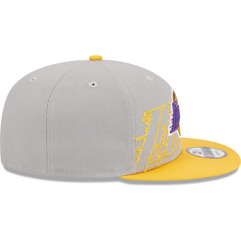 kepure-plokscia-pilka-snapback-9fifty-draft-edition-2023-los-angeles-lakers-nba-new-era