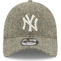 kepure-islenkta-pilka-reguliuojama-juostele-9twenty-tweed-pack-new-york-yankees-mlb-new-era