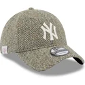 kepure-islenkta-pilka-reguliuojama-juostele-9twenty-tweed-pack-new-york-yankees-mlb-new-era