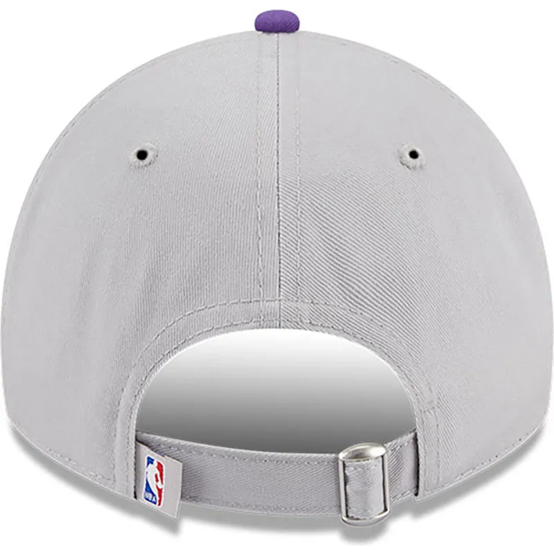 cap-islenkta-gray-adjustable-strap-9twenty-tip-off-2023-los-angeles-lakers-nba-new-era