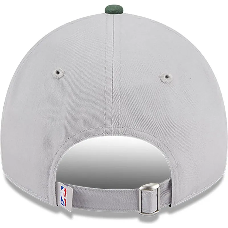 kepure-islenkta-pilka-reguliuojama-juostele-9twenty-tip-off-2023-milwaukee-bucks-nba-new-era
