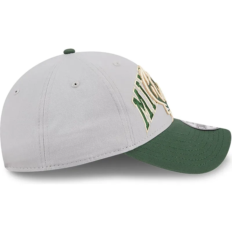 cap-islenkta-gray-adjustable-strap-9twenty-tip-off-2023-milwaukee-bucks-nba-new-era