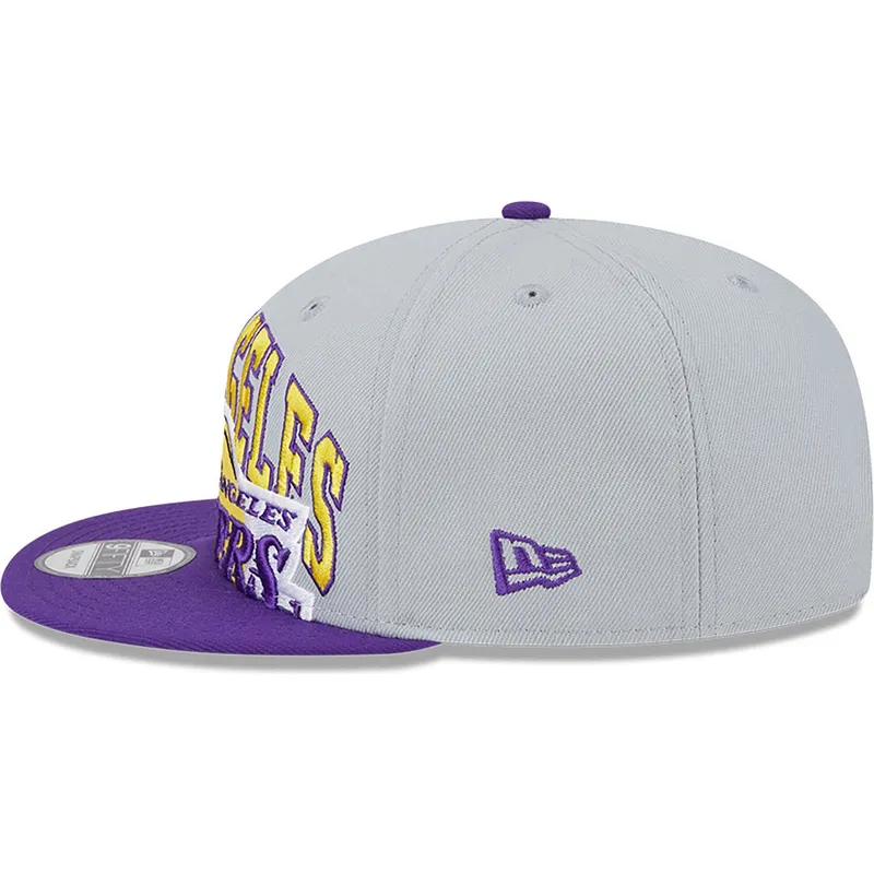 kepure-plokscia-pilka-snapback-9fifty-tip-off-2023-los-angeles-lakers-nba-new-era