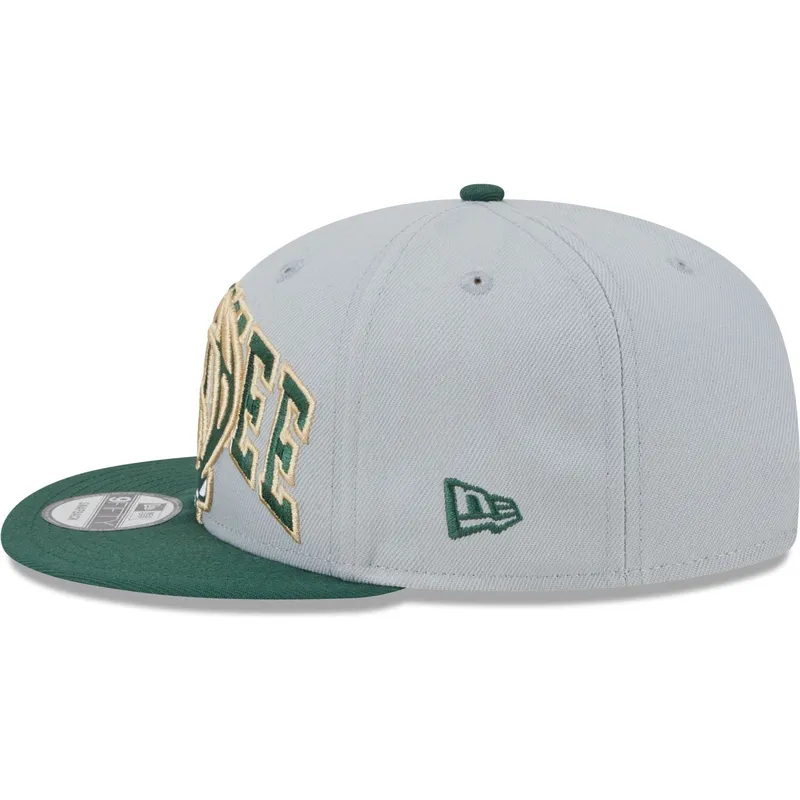 kepure-plokscia-pilka-snapback-9fifty-tip-off-2023-milwaukee-bucks-nba-new-era