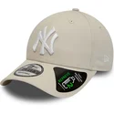 cap-islenkta-beige-adjustable-strap-9forty-repreve-league-essential-new-york-yankees-mlb-new-era