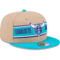 kepure-plokscia-ruda-snapback-9fifty-draft-2024-charlotte-hornets-nba-new-era