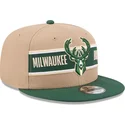 kepure-plokscia-ruda-snapback-9fifty-draft-2024-milwaukee-bucks-nba-new-era