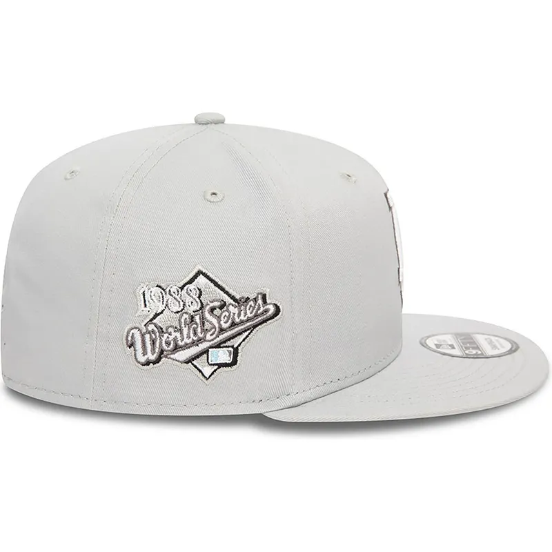 kepure-plokscia-pilka-snapback-9fifty-seasonal-flower-los-angeles-dodgers-mlb-new-era