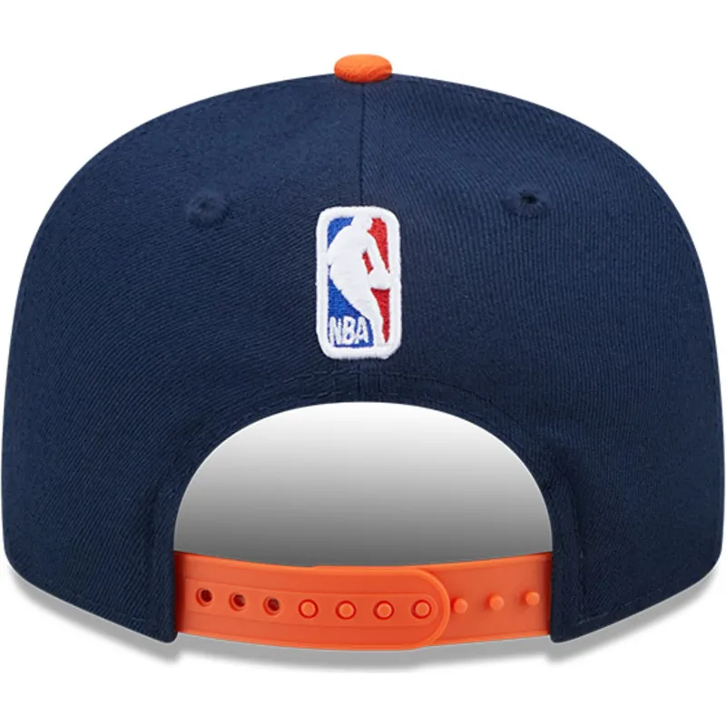 kepure-plokscia-tamsiai-melyna-snapback-9fifty-statement-new-york-knicks-nba-new-era