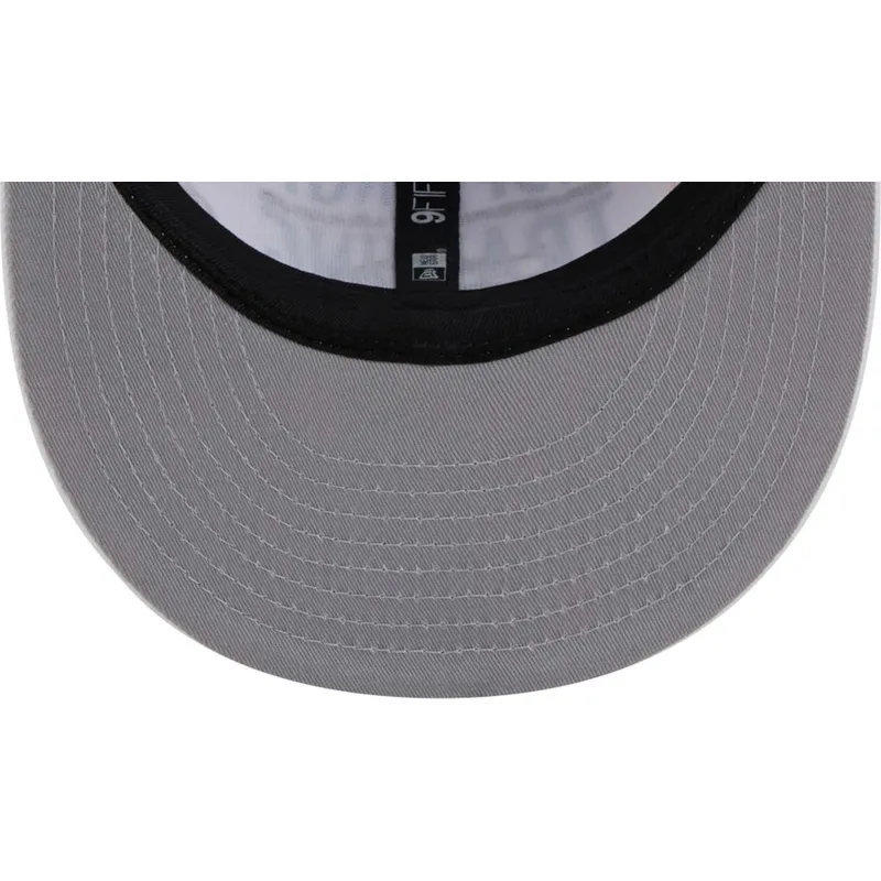 kepure-plokscia-balta-snapback-9fifty-scatter-spring-training-fan-pack-2025-mlb-new-era