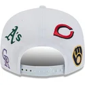 kepure-plokscia-balta-snapback-9fifty-scatter-spring-training-fan-pack-2025-mlb-new-era