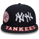 kepure-plokscia-tamsiai-melyna-priglundanti-59fifty-all-over-new-york-yankees-mlb-new-era