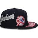 kepure-plokscia-tamsiai-melyna-priglundanti-59fifty-all-over-new-york-yankees-mlb-new-era