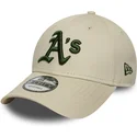 bezowa-zakrzywiona-czapka-regulowana-z-zielonym-logo-9forty-league-essential-oakland-athletics-mlb-od-new-era