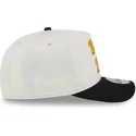 gorra-curva-beige-y-negra-snapback-9fifty-a-frame-chainstitch-de-boston-bruins-nhl-de-new-era