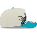 bezowo-niebieska-zakrzywiona-czapka-snapback-9fifty-a-frame-precurved-hardwood-classics-charlotte-hornets-nba-new-era