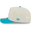 bezowo-niebieska-czapka-z-daszkiem-snapback-9fifty-a-frame-precurved-hardwood-classics-charlotte-hornets-nba-od-new-era