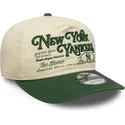 kepure-islenkta-smelio-reguliuojamas-19twenty-washed-graphic-new-york-yankees-mlb-new-era
