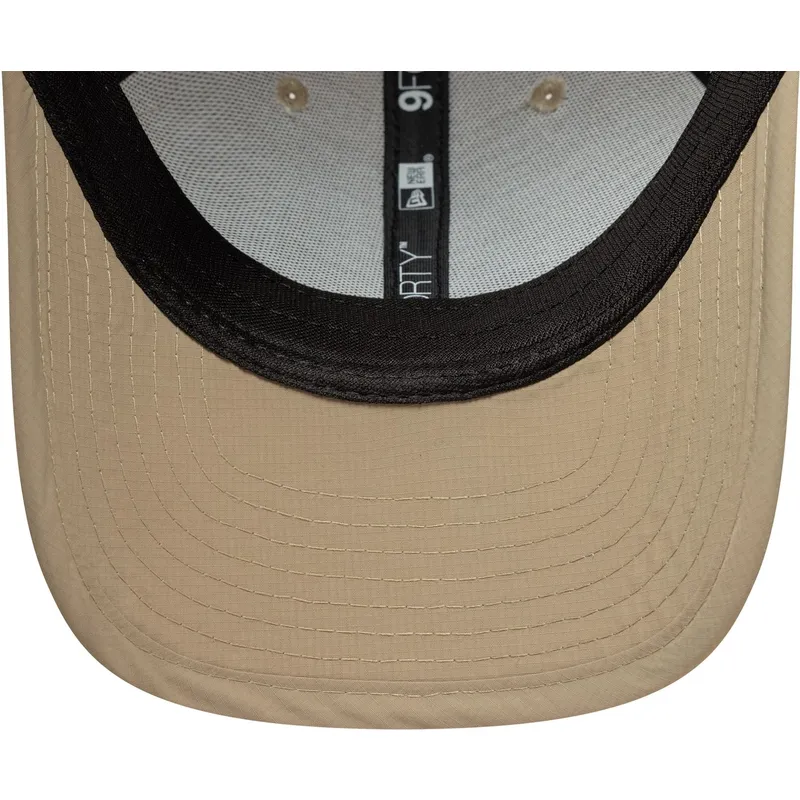 kepure-islenkta-smelio-reguliuojama-juostele-9forty-m-crown-sport-new-era