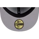 kepure-plokscia-tamsiai-melyna-priglundanti-59fifty-all-over-new-york-yankees-mlb-new-era