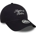 kepure-islenkta-tamsiai-melyna-reguliuojama-juostele-9twenty-aspire-to-retire-slogan-new-era