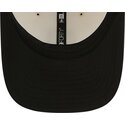 new-era-curved-brim-9forty-m-crown-training-pack-2026-las-vegas-raiders-nfl-beige-and-black-snapback-cap