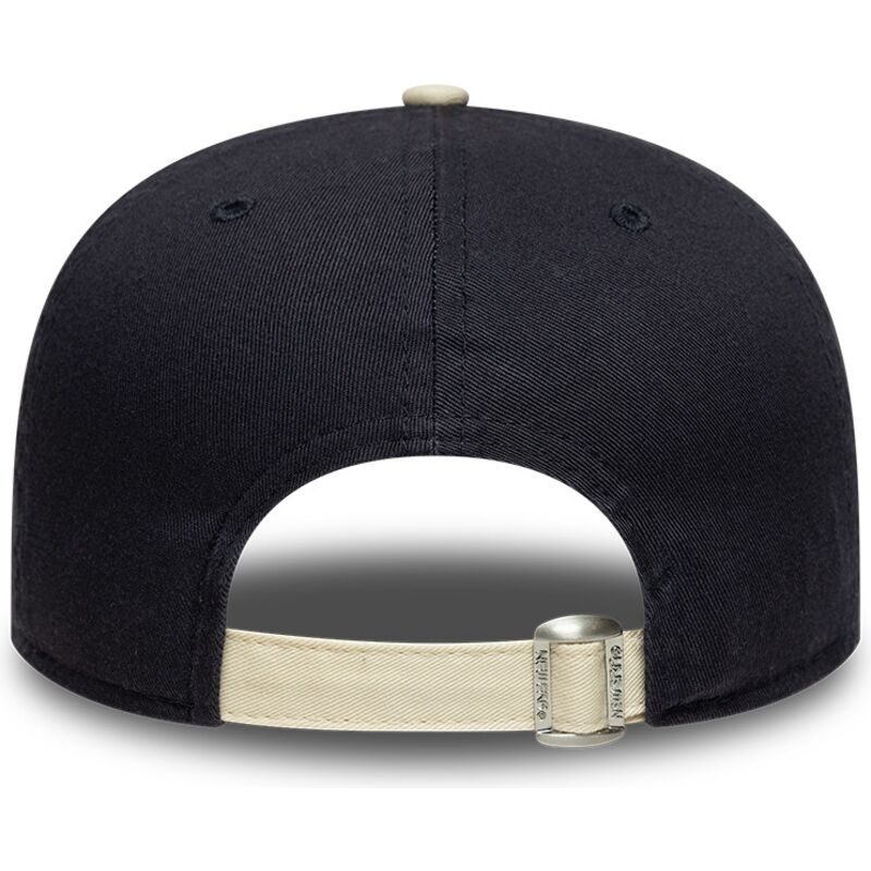 kepure-islenkta-tamsiai-melyna-reguliuojamas-19twenty-washed-graphic-new-era